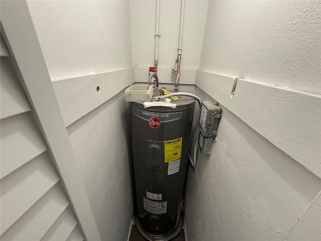 utility room with electric water heater