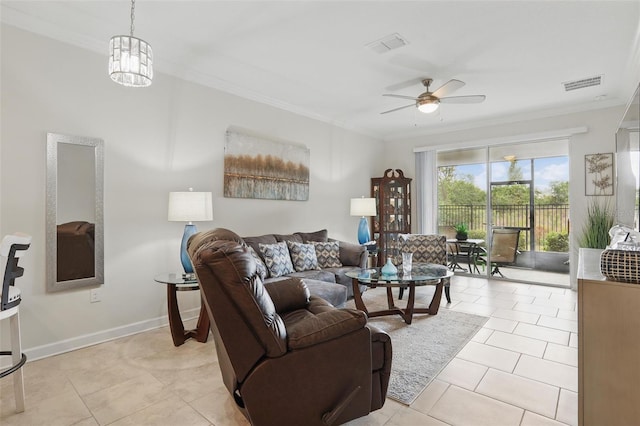 living area featuring light tile patterned floors, baseboards, visible vents, ceiling fan, and crown molding