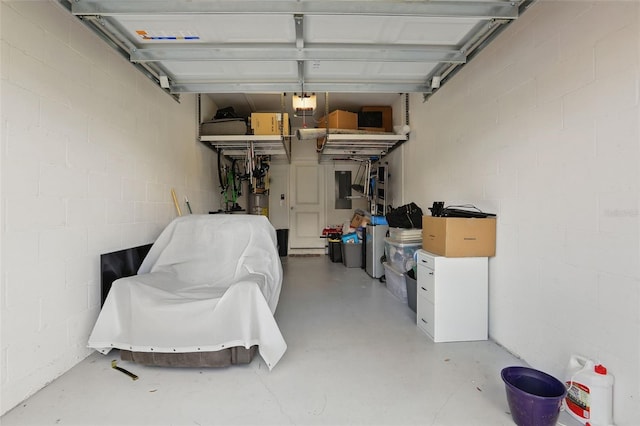 garage featuring concrete block wall