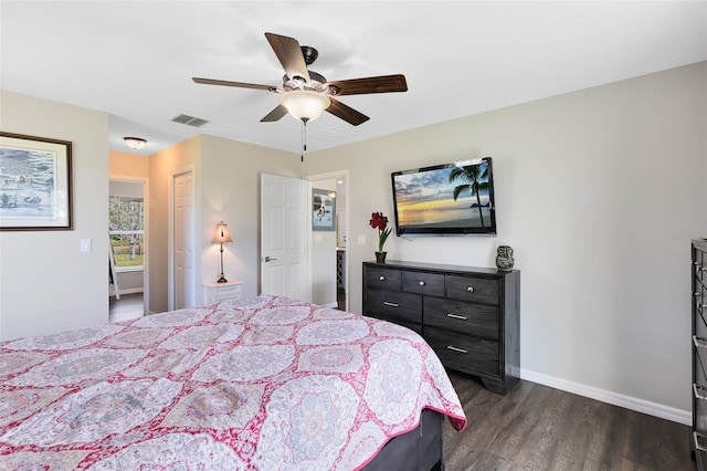 bedroom featuring visible vents, a ceiling fan, baseboards, and dark wood-style flooring