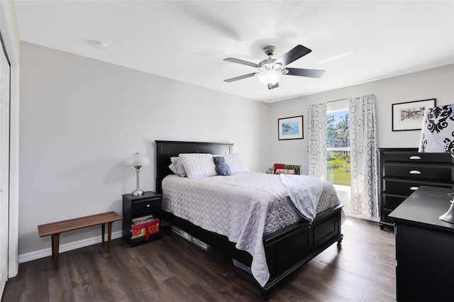 bedroom with dark wood-type flooring, baseboards, and ceiling fan