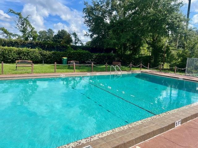 pool featuring fence