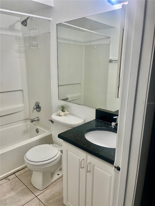 731 Wyman Ct Unit 731-A, Orlando, FL 32809 - bathroom featuring shower / bath combination, vanity, tile patterned floors, and toilet