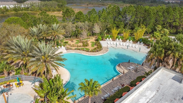 pool featuring a patio and fence