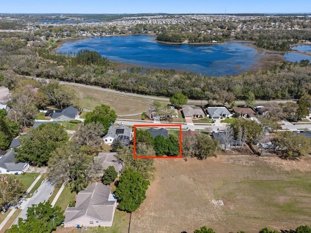 aerial view featuring a water view and a residential view