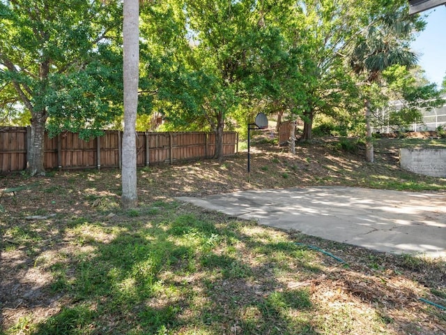 view of yard with fence