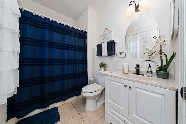 full bath featuring tile patterned floors, toilet, and vanity