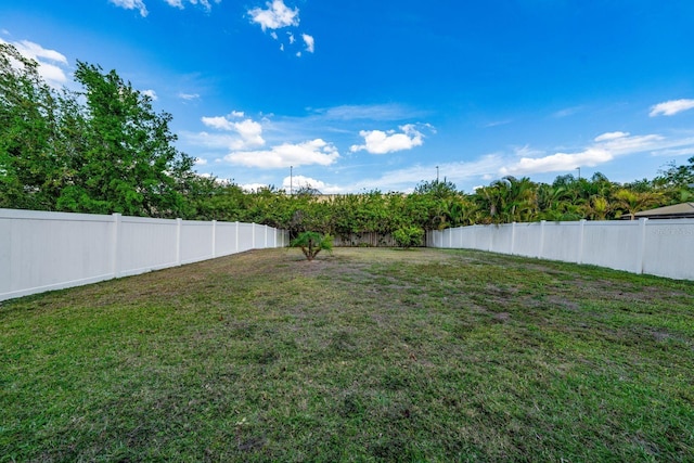 view of yard featuring a fenced backyard