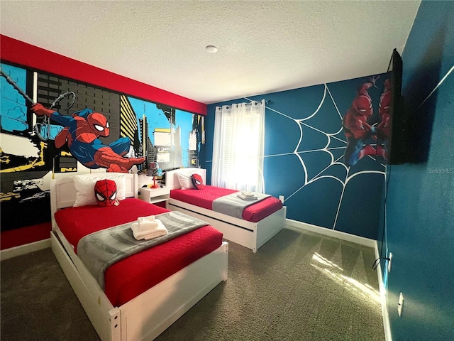 carpeted bedroom with baseboards and a textured ceiling