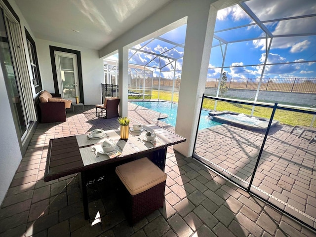 view of patio with glass enclosure, an in ground hot tub, and an outdoor pool