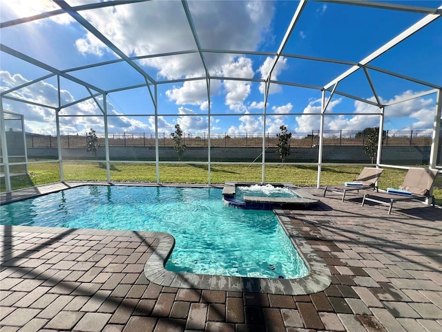 view of swimming pool featuring a pool with connected hot tub, a patio, fence, glass enclosure, and a yard