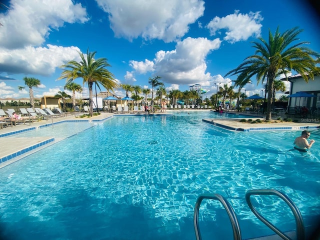 community pool with a patio