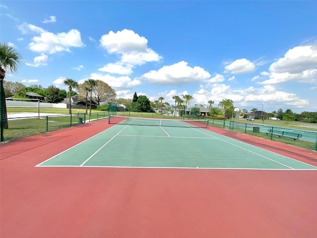 view of sport court with community basketball court and fence