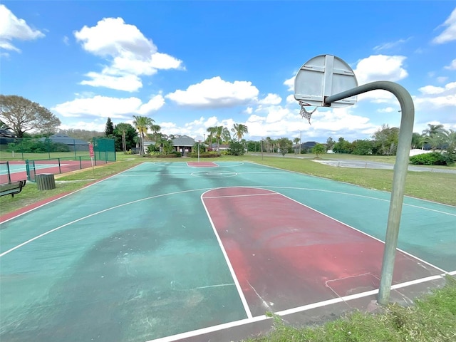 view of sport court featuring community basketball court and fence