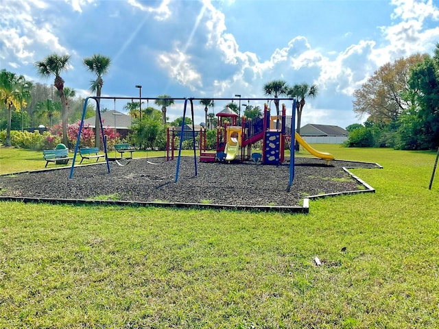 communal playground with a lawn