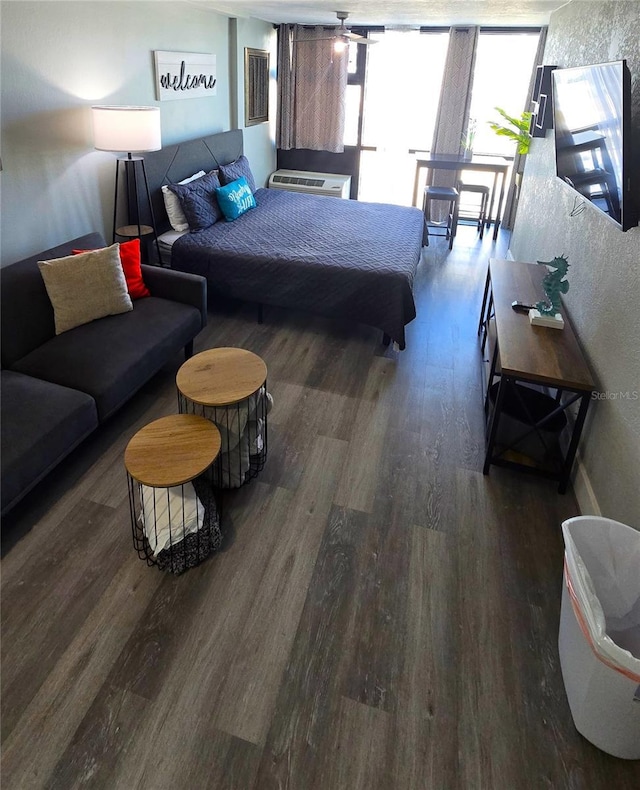 bedroom with wood finished floors