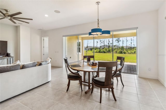 dining area with light tile patterned floors, baseboards, ceiling fan, and recessed lighting