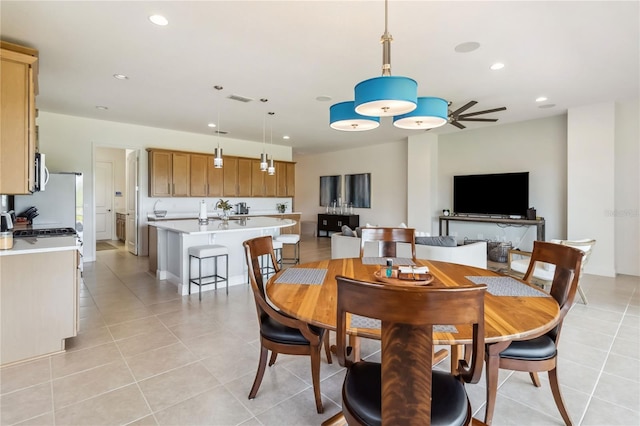 dining space with light tile patterned flooring, visible vents, recessed lighting, and ceiling fan