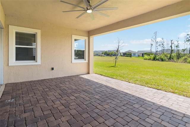 view of patio with a ceiling fan