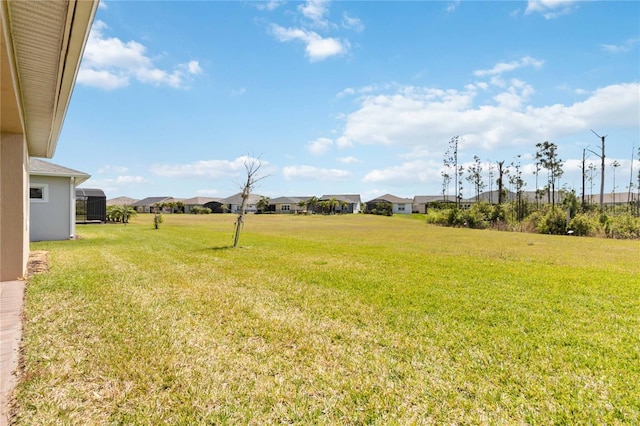 view of yard with a residential view