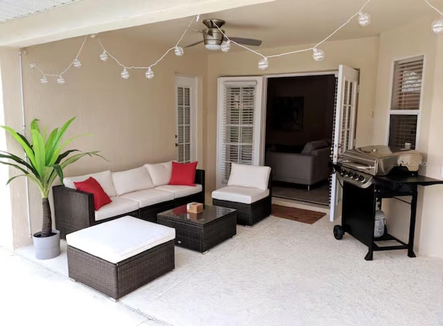 living room featuring ceiling fan