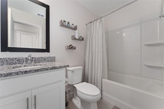 bathroom with vanity, toilet, shower / bath combo, and visible vents