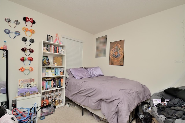 bedroom featuring carpet