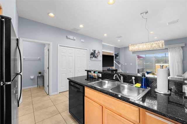 kitchen featuring black appliances, a sink, decorative light fixtures, recessed lighting, and light tile patterned flooring