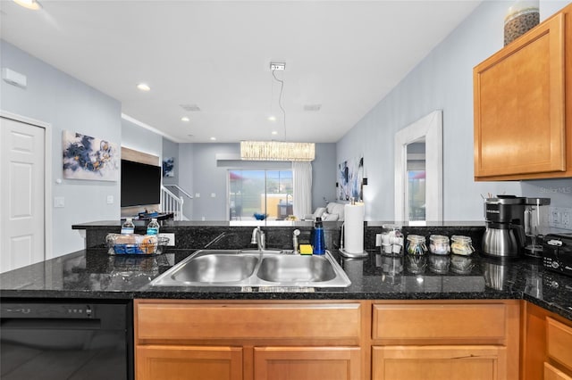 kitchen with dark stone countertops, recessed lighting, a sink, black dishwasher, and open floor plan