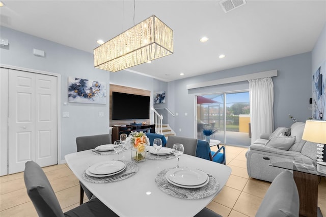 dining area with recessed lighting, visible vents, tile patterned floors, and stairway