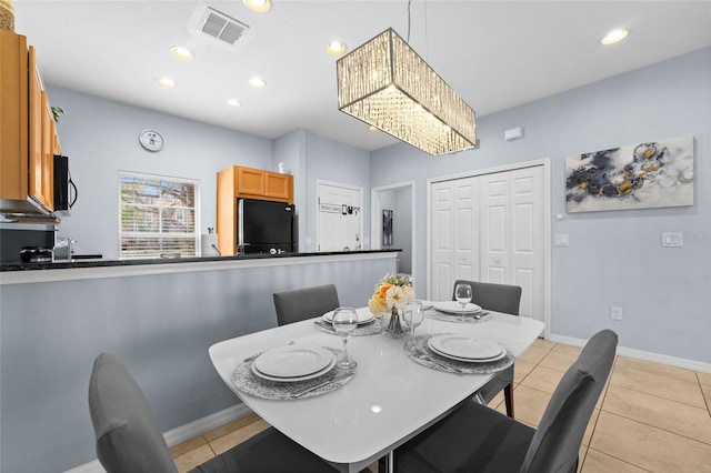 dining space with recessed lighting, light tile patterned floors, baseboards, and visible vents