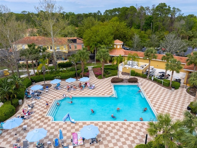 community pool with a patio