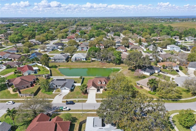 aerial view with a residential view and a water view