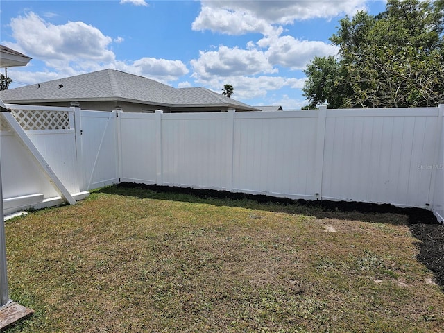 633 Kangaroo Dr, Kissimmee, FL 34759 - view of yard with a fenced backyard and a gate