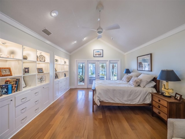 bedroom with visible vents, lofted ceiling, ornamental molding, access to exterior, and light wood-style floors