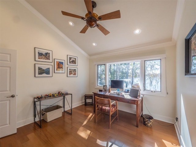 office featuring baseboards, lofted ceiling, wood finished floors, and crown molding