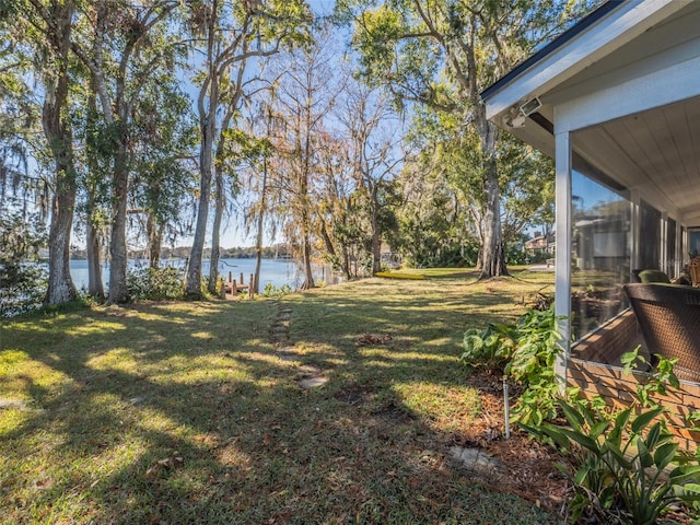 view of yard featuring a water view