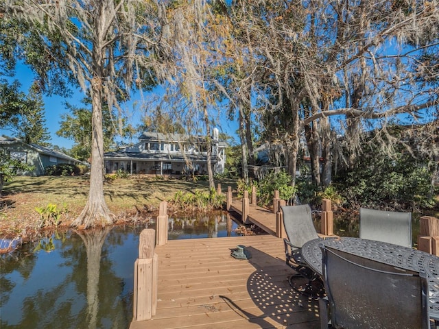 view of dock featuring a water view