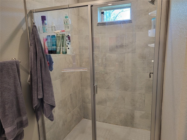 bathroom with a stall shower