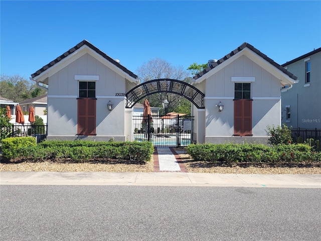 view of home's community with fence