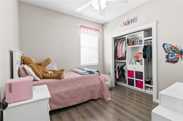 bedroom with a closet, ceiling fan, and wood finished floors