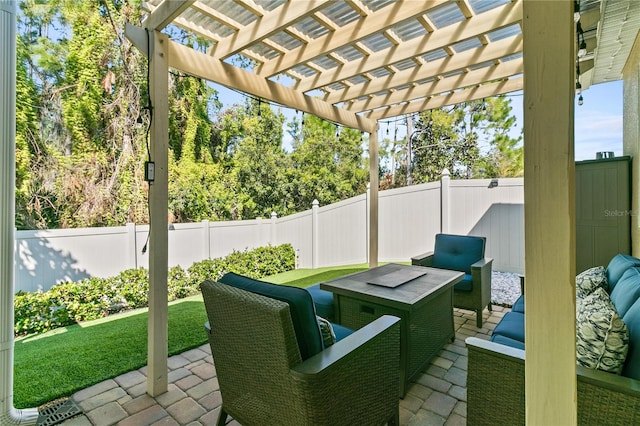 view of patio featuring a fenced backyard, outdoor lounge area, and a pergola