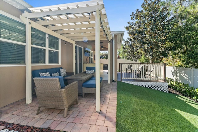 view of patio featuring a pergola, an outdoor living space, fence, a wooden deck, and ceiling fan