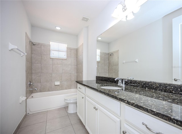 full bath with visible vents, toilet,  shower combination, tile patterned flooring, and vanity