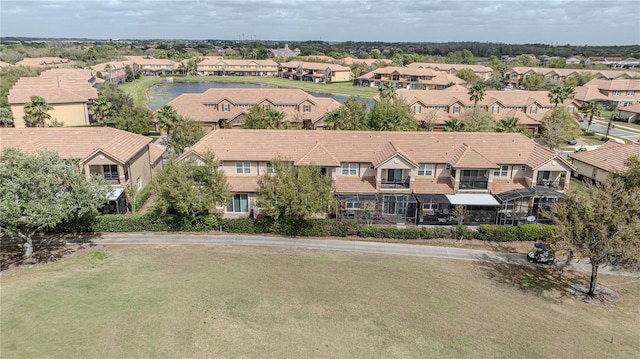 birds eye view of property with a residential view