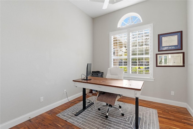 office featuring wood finished floors, baseboards, and ceiling fan