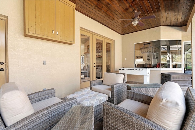 view of patio / terrace with french doors and ceiling fan