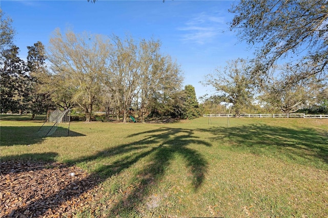 view of yard featuring fence