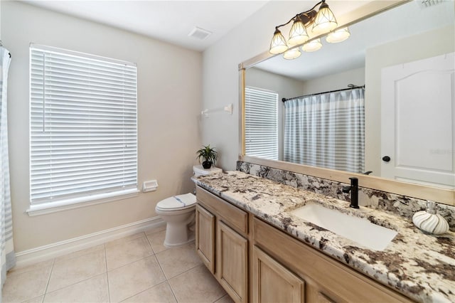 bathroom featuring tile patterned floors, visible vents, toilet, baseboards, and vanity