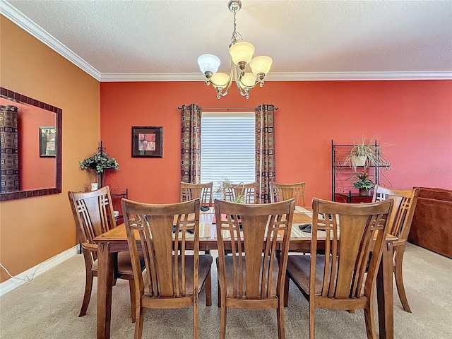 dining room with crown molding, baseboards, carpet floors, an inviting chandelier, and a textured ceiling